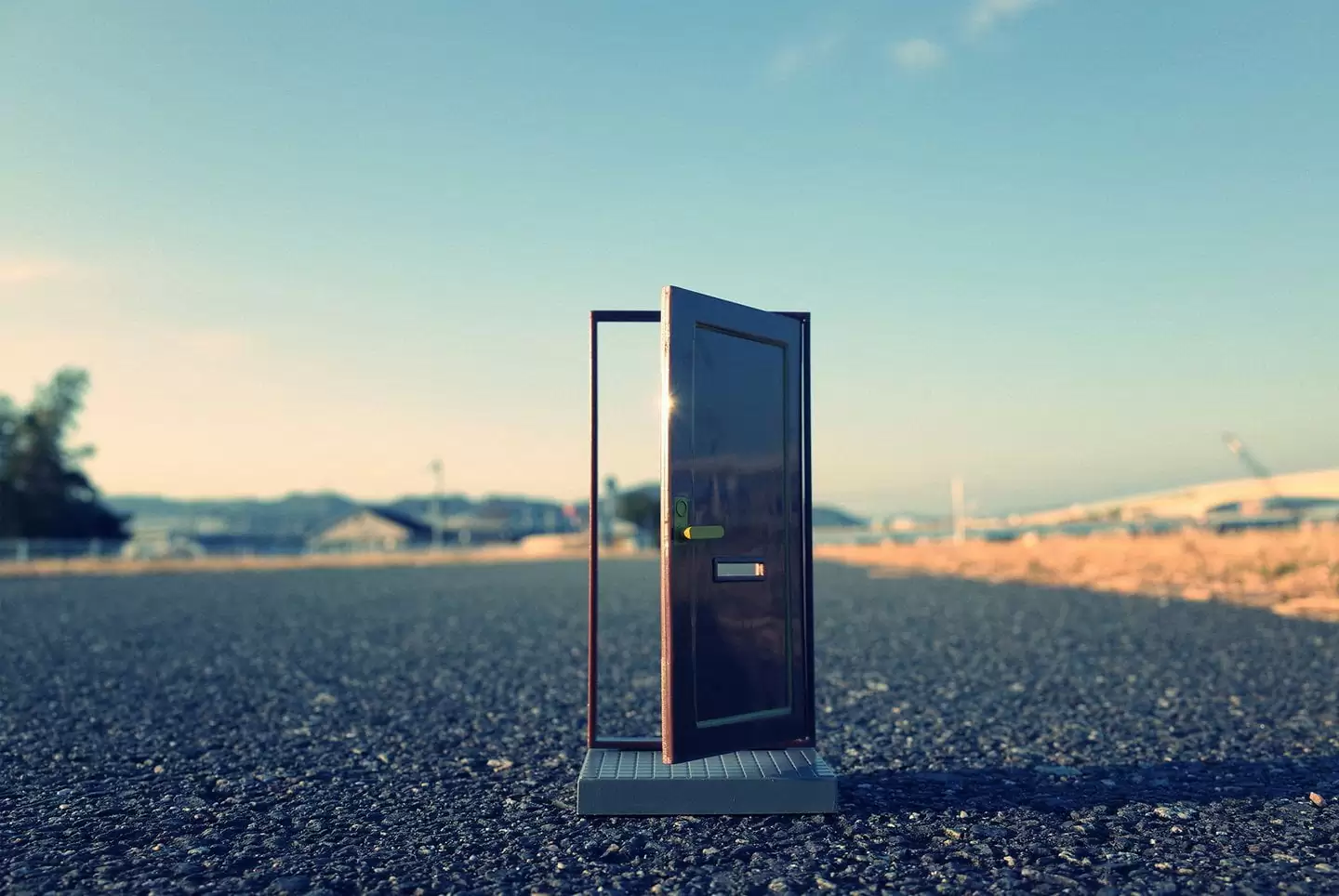 Image of a door that is opened without walls